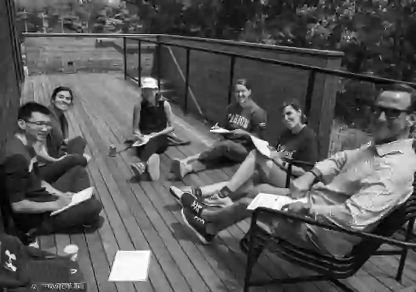 Staff meeting outside in the sun